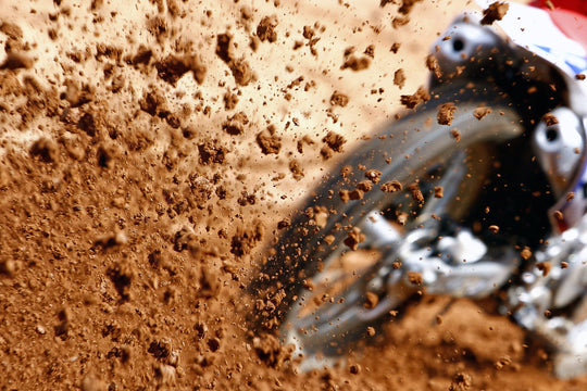 Dirt being kicked up by motocross rider